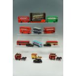 A Dinky Toys Routemaster bus together with Corgi Routemaster buses, taxis etc