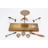 A brass-mounted oak cribbage board, a miniature brass tripod chess table, pastry jiggers and