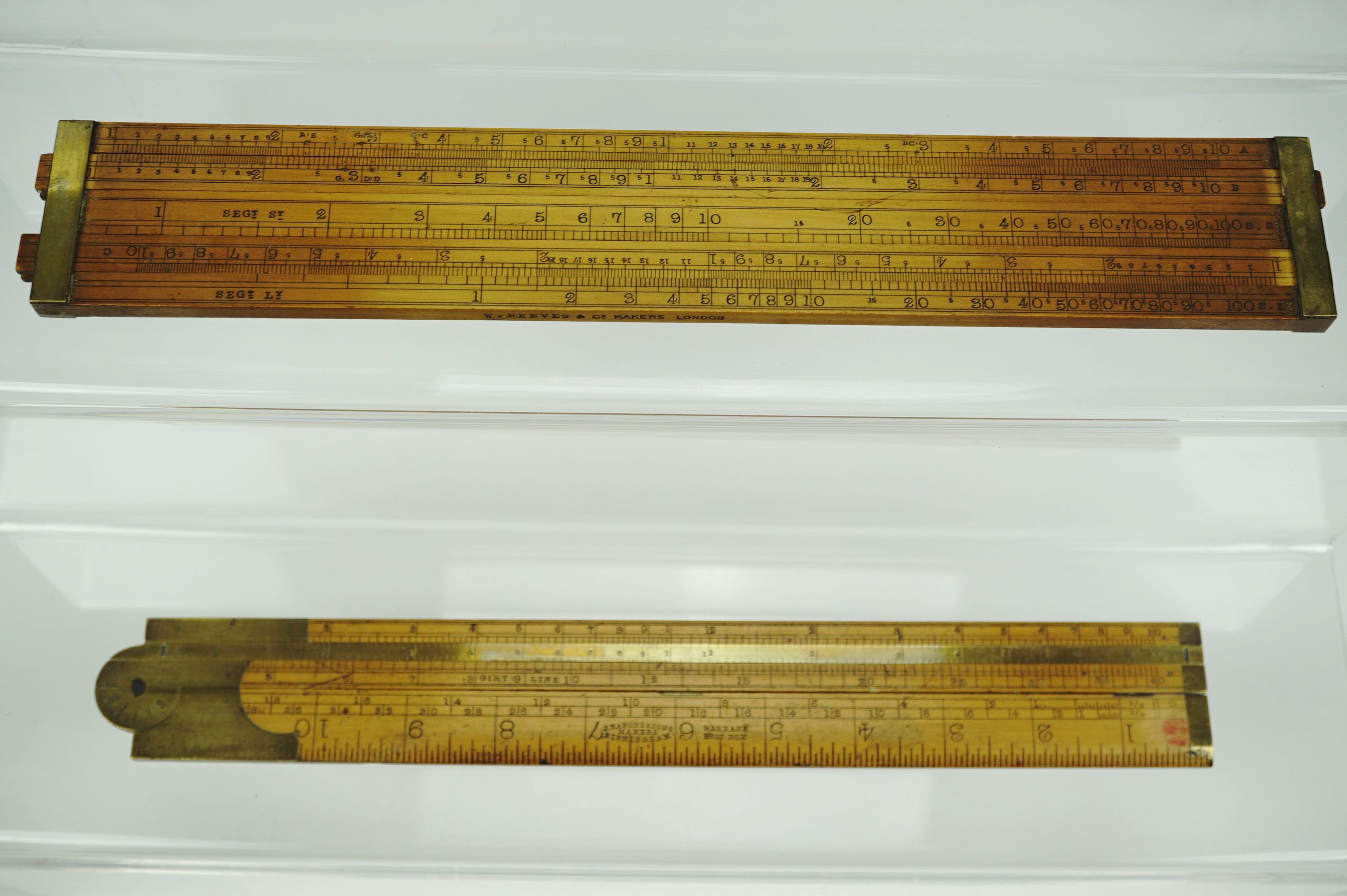 A Reeves Customs and Excise type brass-mounted box wood ruler / gauge, together with a Rabone timber