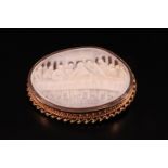 A 9 ct gold mounted shell cameo brooch depicting Da Vinci's "The Last Supper", 3.5 cm x 4.5 cm, 11.5