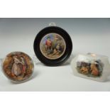 Three Victorian Pratt pot lids, one mounted and framed another depicting Scottish stalking
