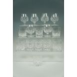 Nine crystal whiskey tumblers and six brandy glasses