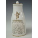 A mid 19th century milk jug, transfer printed in depiction of a grotesque figure with the tract: "