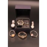 A cased English Laundry watch and cuff links set together with a small quantity of watches