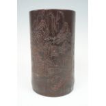 A Chinese bamboo bitong / brush pot, carved in depiction of a rural idyll and calligraphy, 15 cm