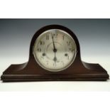 A Kienzle mahogany Napoleon hat mantle clock, clock face 15 cm diameter