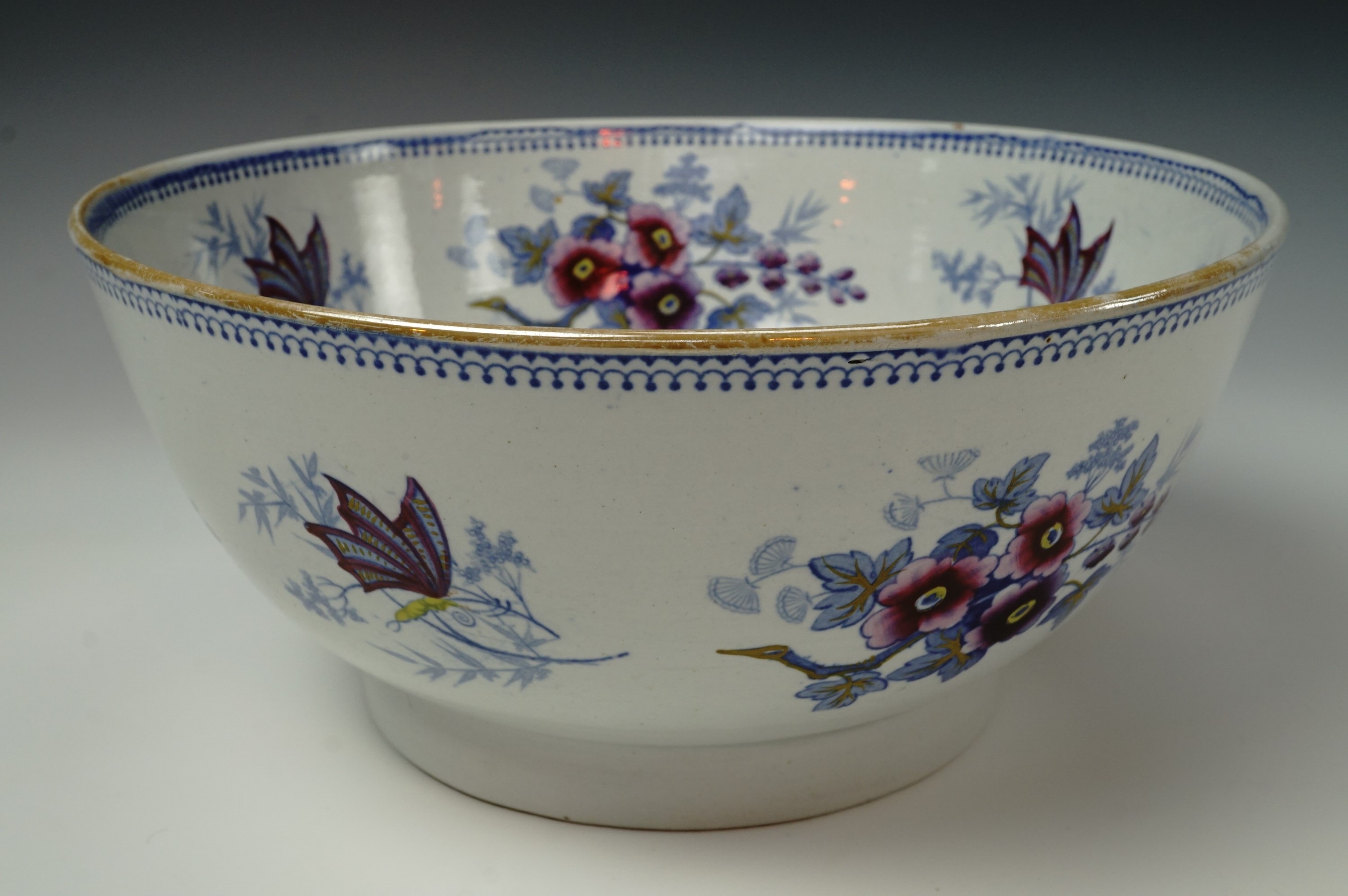 An early Victorian Ridgway 'Japan Flowers, Stone China' bowl decorated with flowers and butterflies,