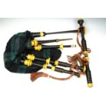A set of 1950s British army issue great highland bagpipes, Ordnance broad arrow marked and dated