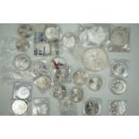 A Mexican five ounce fine silver coin together with two 2 ounce coins nineteen 1 ounce coins and