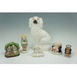 A 19th century Toby mug, Toby condiment, miniature Toby jug, fairing, fireside spaniel, and