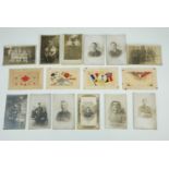 A small group of Great War photographic portrait and silk postcards
