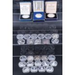 28 various cased and other silver commemorative coins celebrating space exploration, the Second
