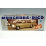 A vintage boxed model of a Mercedes 450 SE by Rico with working lights etc., 45 cm