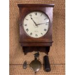 A Victorian oak cased wall clock by J Shipley of Derby, having a weight driven movement with alarum,