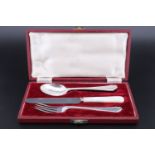 A cased silver christening set