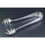 A flamboyant set of 1930s silver sugar tongs, the terminals in the form of exaggerated claws,