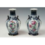 A pair of Losol Ware blue and white 'Bourbon' vases, having bulbous form with two handles, decorated