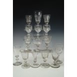 A quantity of largely late Georgian wine glasses