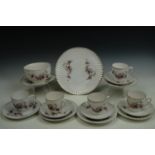 A Victorian spirally fluted and blossom-transfer-printed part tea set