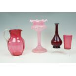 19th century cranberry glass jug, a beaker, ruby glass stem vase and a 19th century pink glass