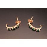 A pair of contemporary emerald, diamond and yellow metal half hoop earrings, 1.5 cm drop, 1 g