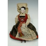 A 19th Century porcelain articulated doll in Norwegian costume