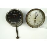 A Jaeger fascia clock together with another by Smiths of London, (running when catalogued,