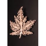 A German Sterling white metal filigree brooch in the form of a sycamore leaf, 5 cm