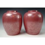A pair of late 20th century Poole Pottery mottled pink vases of bulbous form, 22 cm
