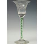 A fine 20th Century reproduction of a mid 18th Century wine glass, having a bell shaped bowl with