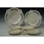 Two pairs of 19th century creamware moulded leaf dishes, having handles formed from the leaf stalks,