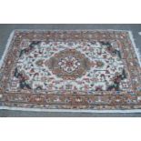 Indian rug with a medallion design on an ivory ground, 6ft x 4ft approximately, together with a
