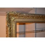 19th Century gilded composition swept frame, 32.5ins x 24.75ins rebate, together with four other