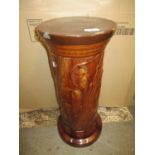 Late 19th / early 20th Century Burmantoft brown treacle glazed jardiniere stand having spiral