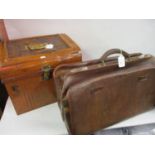Early 20th Century leather holdall together with a 19th Century tin hat box