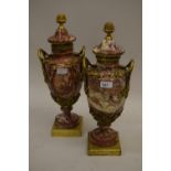 Pair of 19th Century French pink flecked marble and ormolu mounted two handled pedestal urns with