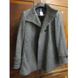 Jaeger ladies black and grey herringbone tweed coat, size 12 (as new with labels) and a Jaeger
