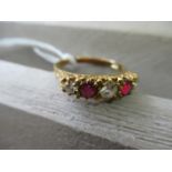 18ct Yellow gold ring set three diamonds and two rubies