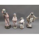 Lladro figure of a Geisha, 11.5ins high, similar figure holding a parasol, 10.5ins (damages to