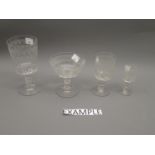 Part set of floral etched and facet cut pedestal drinking glasses, circa 1900