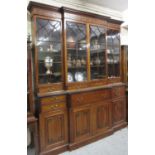 Good quality mid 20th Century mahogany breakfront secretaire bookcase, the dentil and key pattern