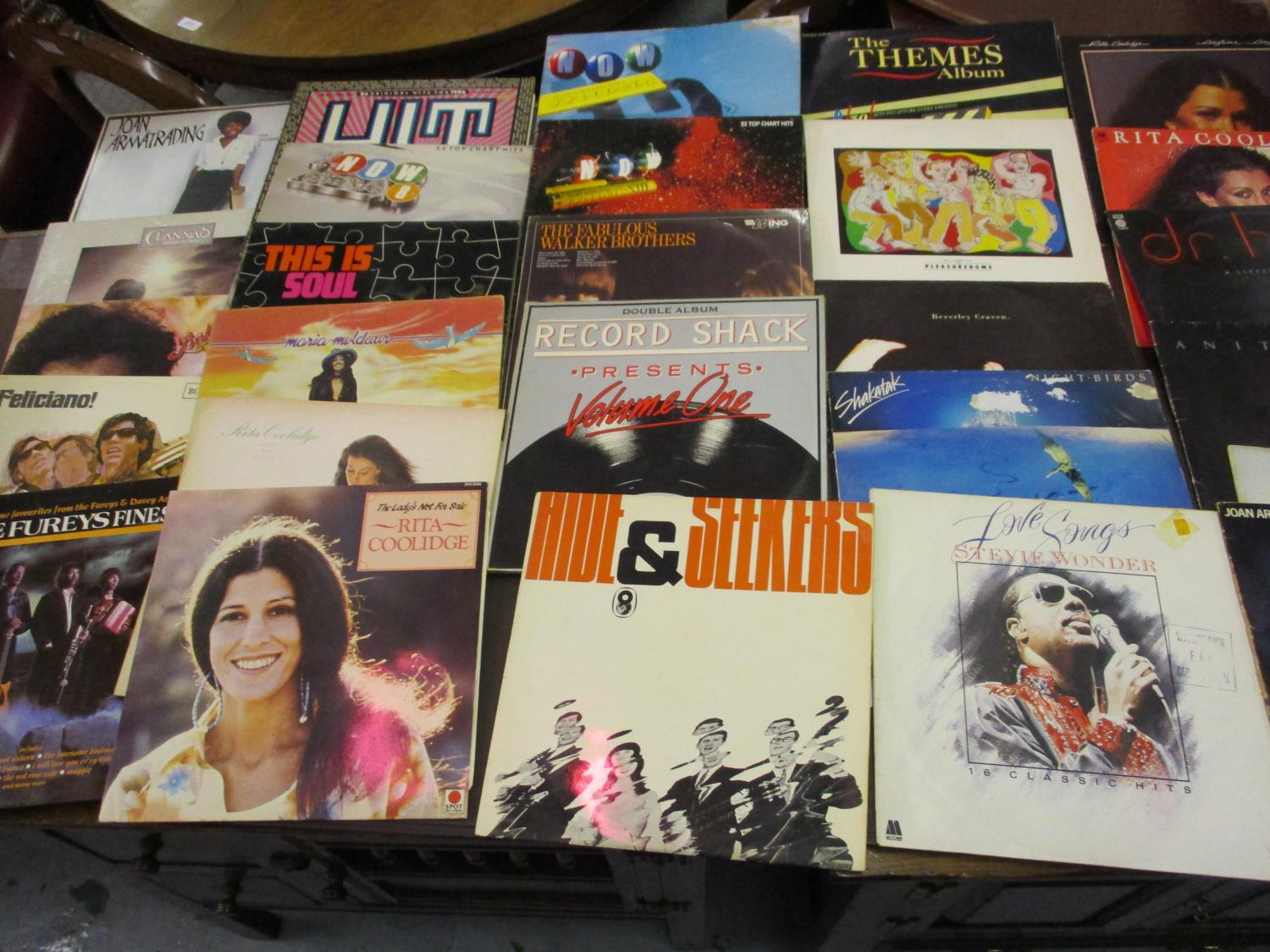 Two cases containing a collection of L.P. records, mainly 1970's and '80's including: Status Quo,