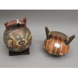 Nazca type twin spouted pottery flask with painted stylised animal decoration, 6ins tall (