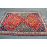 North West Persian rug with twin polychrome medallion design and borders, 6ft 6ins x 4ft 8ins