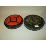 20th Century Chinese black lacquer circular box, the floral painted lid enclosing five lift-out
