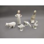 Two small Lladro figures of girls, 8ins and 7.5ins, together with a Lladro figure of a polar bear