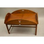 Reproduction mahogany drop flap butler's tray type coffee table