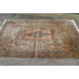 Indo Persian rug with a medallion and all-over floral design on an ivory ground with borders, 8ft