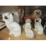 Pair of 19th Century Staffordshire figures of seated dogs together with two single figures, a