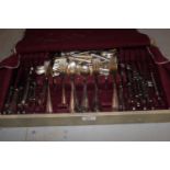 Cased part canteen of silver plated cutlery together with a quantity of loose plated cutlery